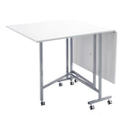 Table pliante artisanale et de coupe blanche/argentée à roulettes, 1 personne
